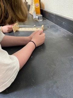 6th grade learning about types of potential energy.