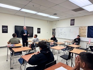 Mr. Palmateer teaching history class