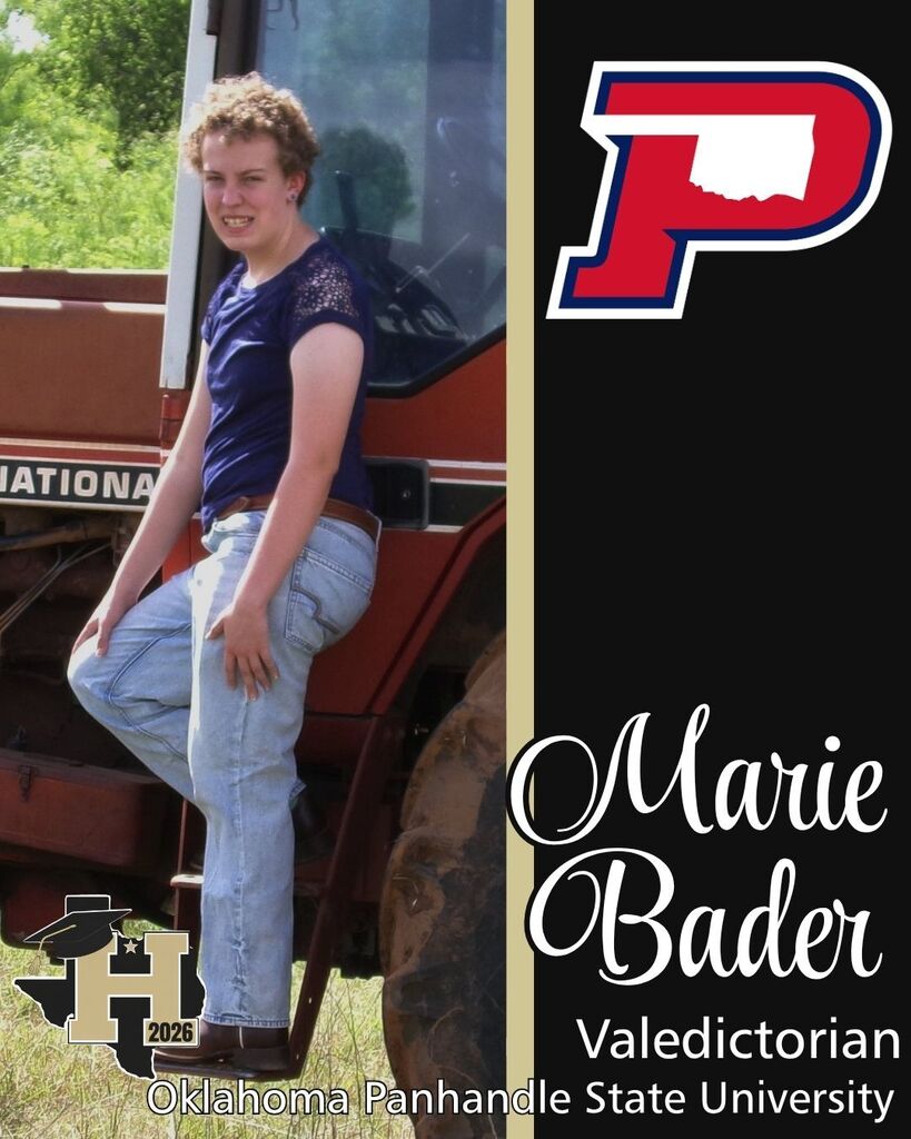 A young woman stands on a tractor with an Oklahoma Panhandle State University logo. She wears a blue top, jeans, and brown shoes.