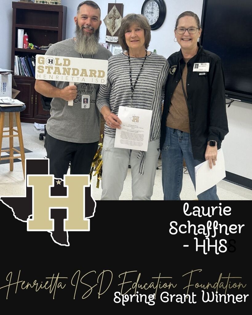 Three people stand together holding papers. A man holds a sign reading "GOLD STANDARD." The middle person holds a certificate.