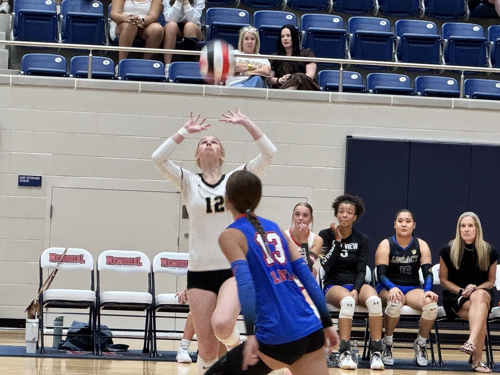 Lyndee sets up the hitter.