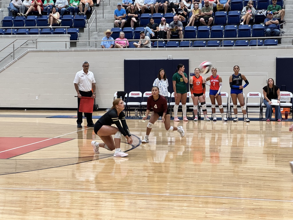 Taylee is down and ready to dig the ball.