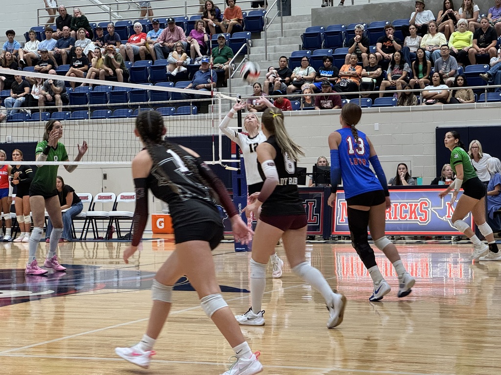 Lyndee sets up the hitter.