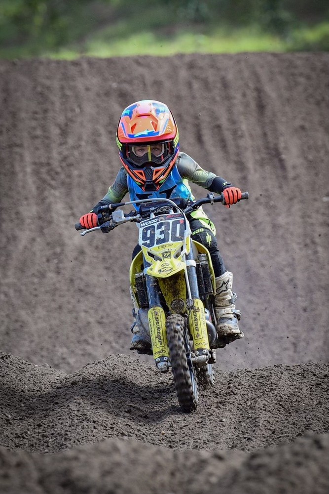 boy on dirt bike with number 930