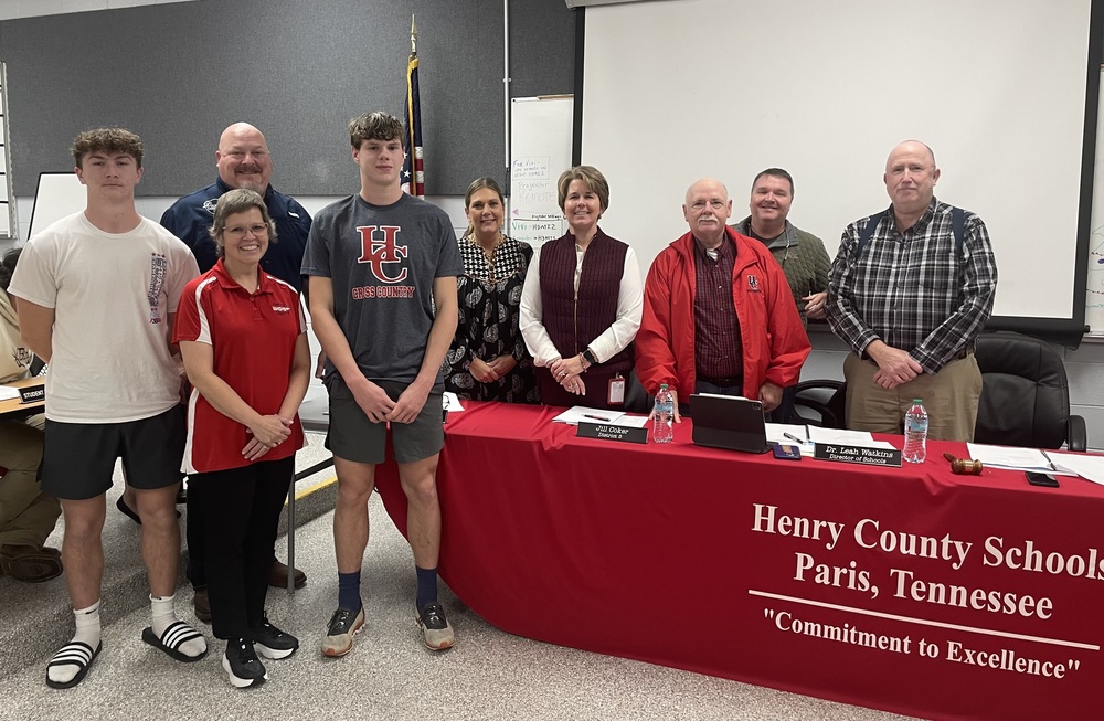 adults and teens around the table