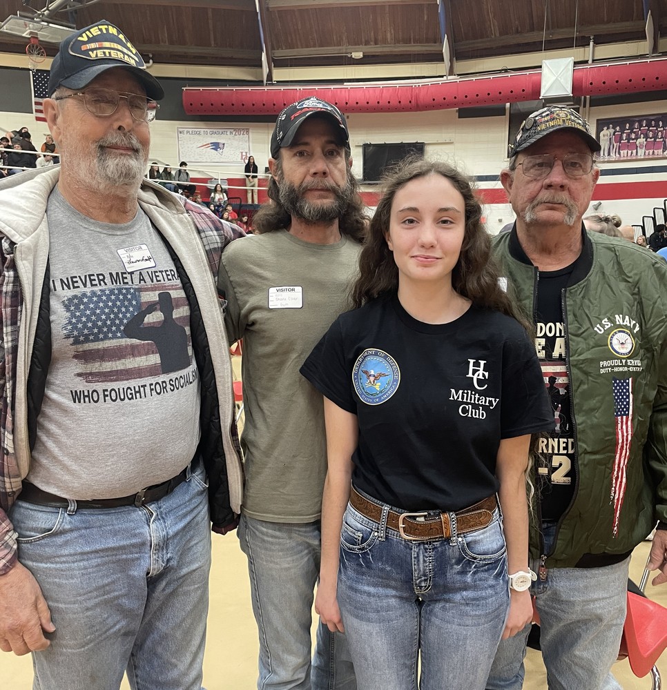 Veterans at a high school program