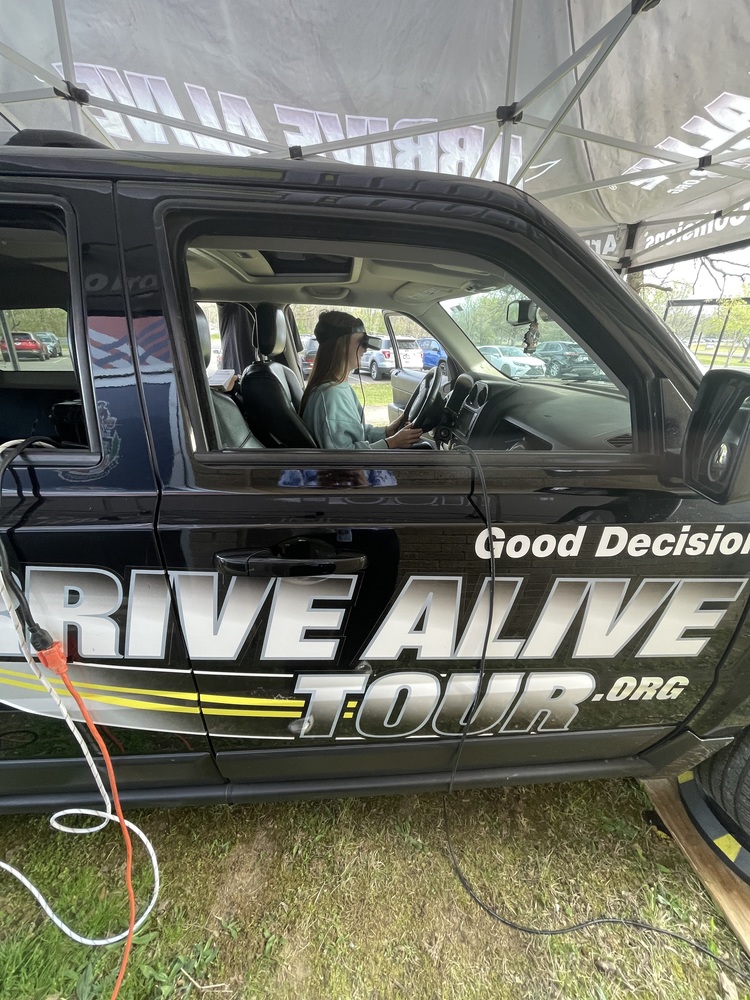 student in simulation car