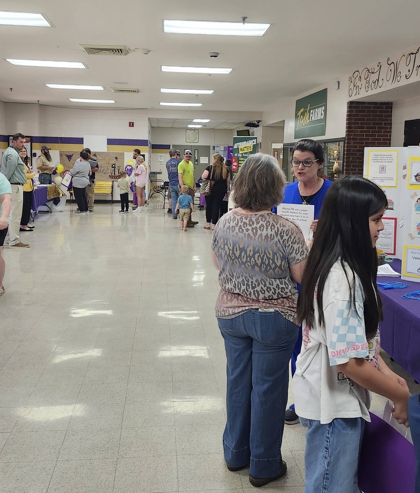 families in school foyer