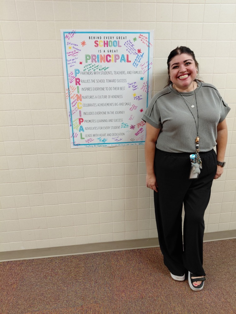 Mrs.Gaucin with appreciation poster 
