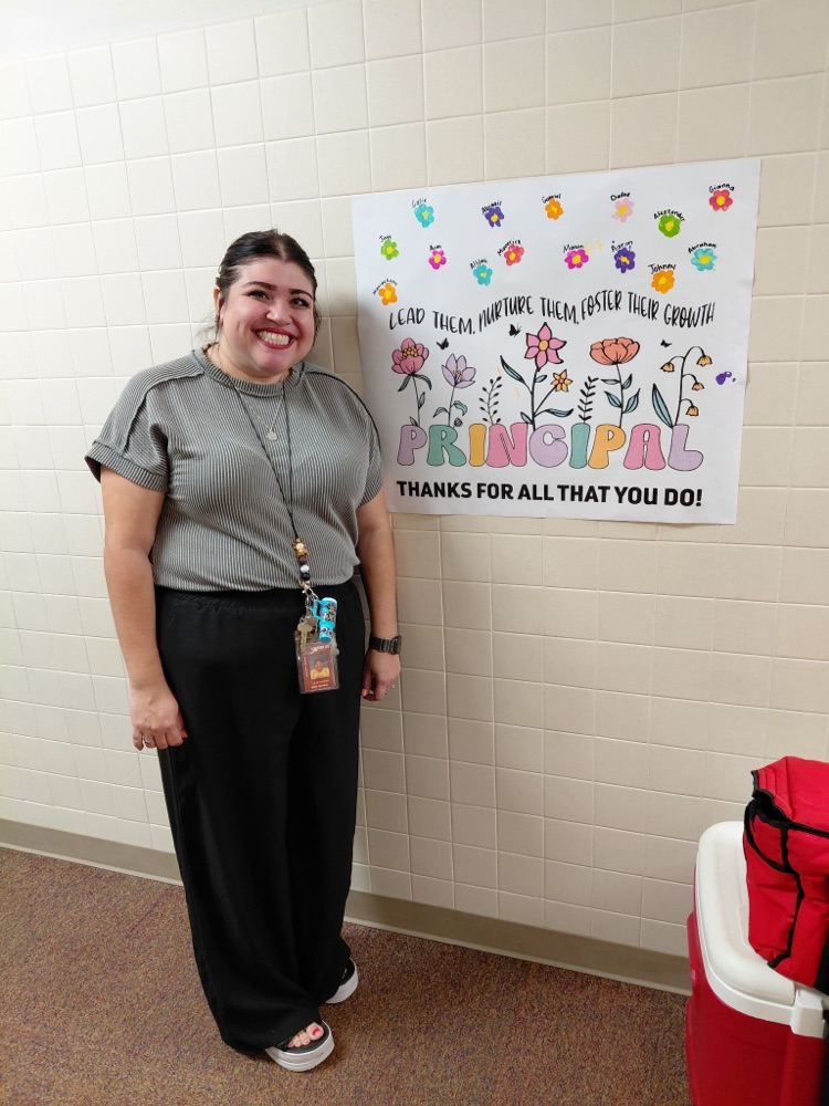 Mrs.Gaucin with appreciation poster 