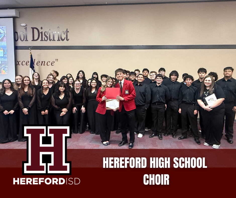 Group photo of choir members in black outfits. A woman holds a certificate, standing behind a man.