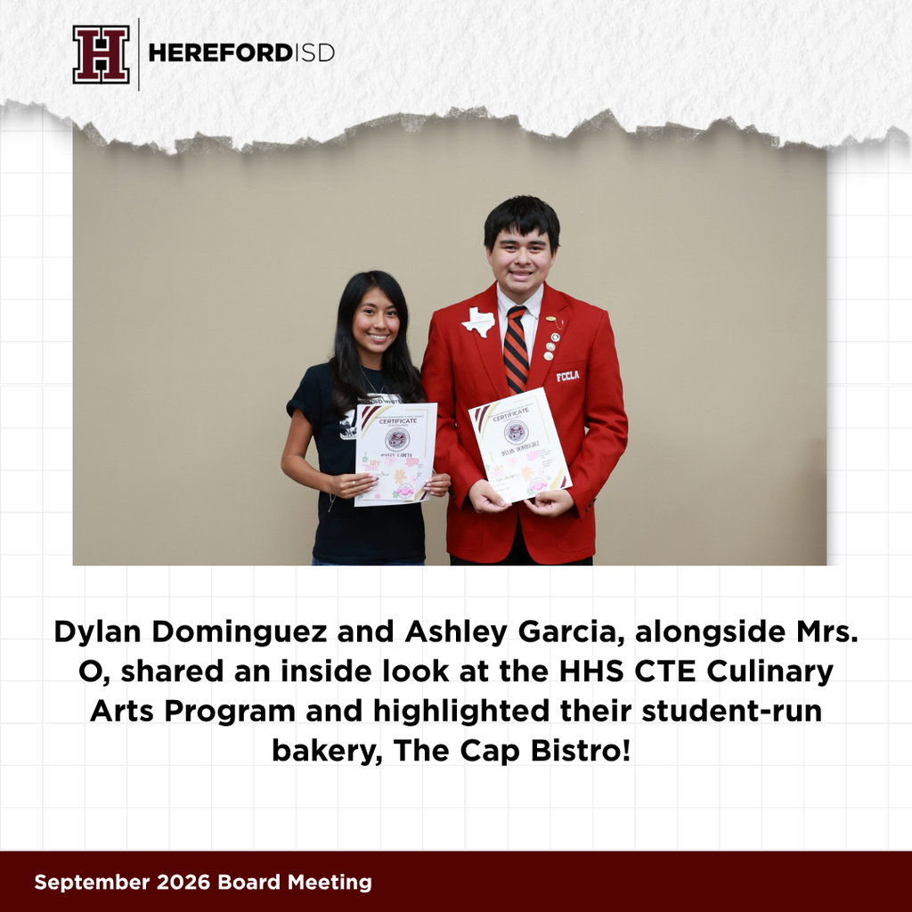 Two students hold certificates; one in black, the other in red. They stand before a beige background.