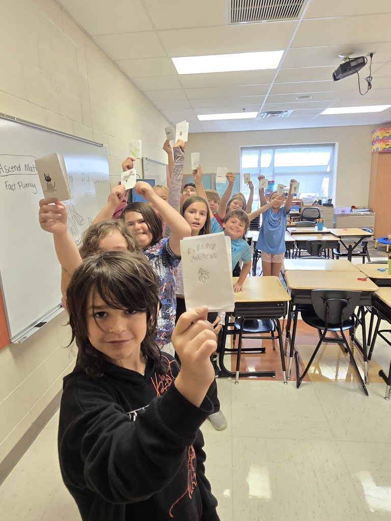 Some fourth graders with their books
