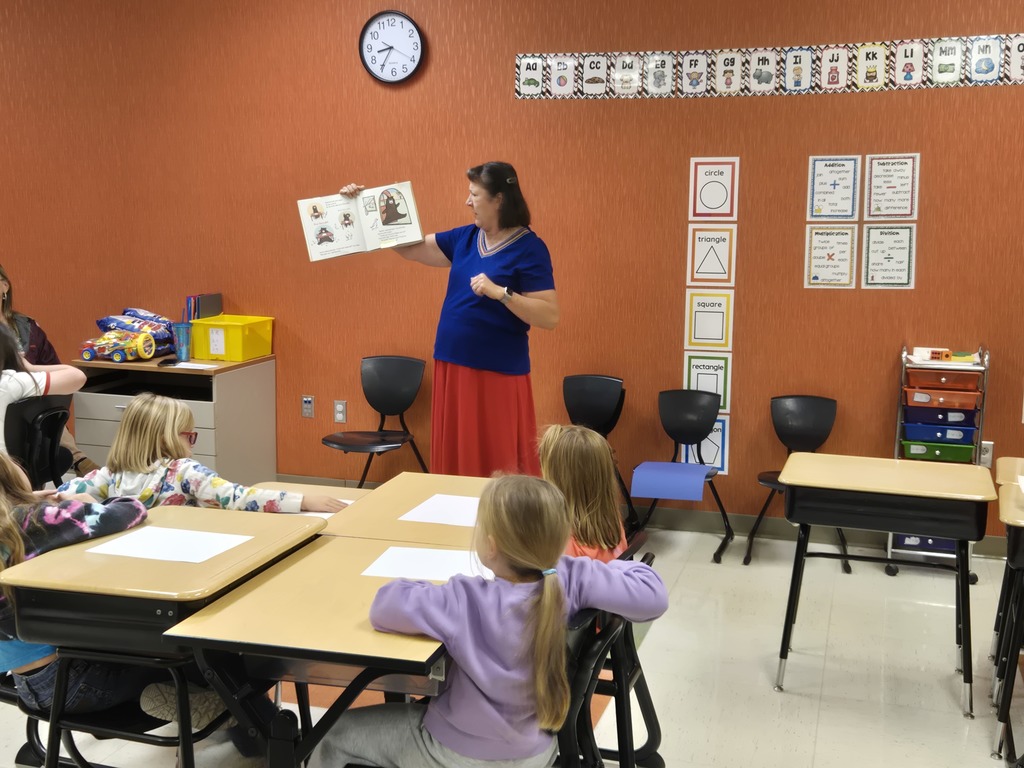 Ms. Susan sharing the book BEARNARD WRITES A BOOK.