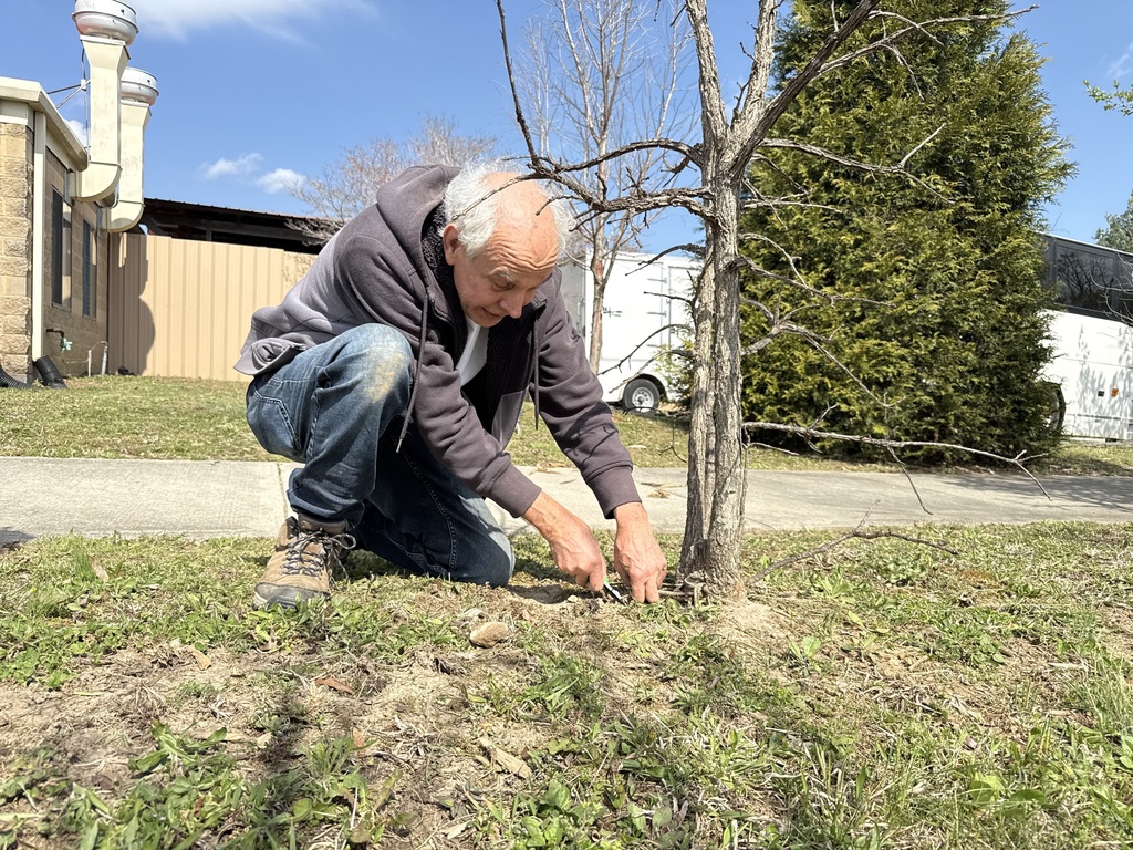 Pr. Castells sprucing up our campus