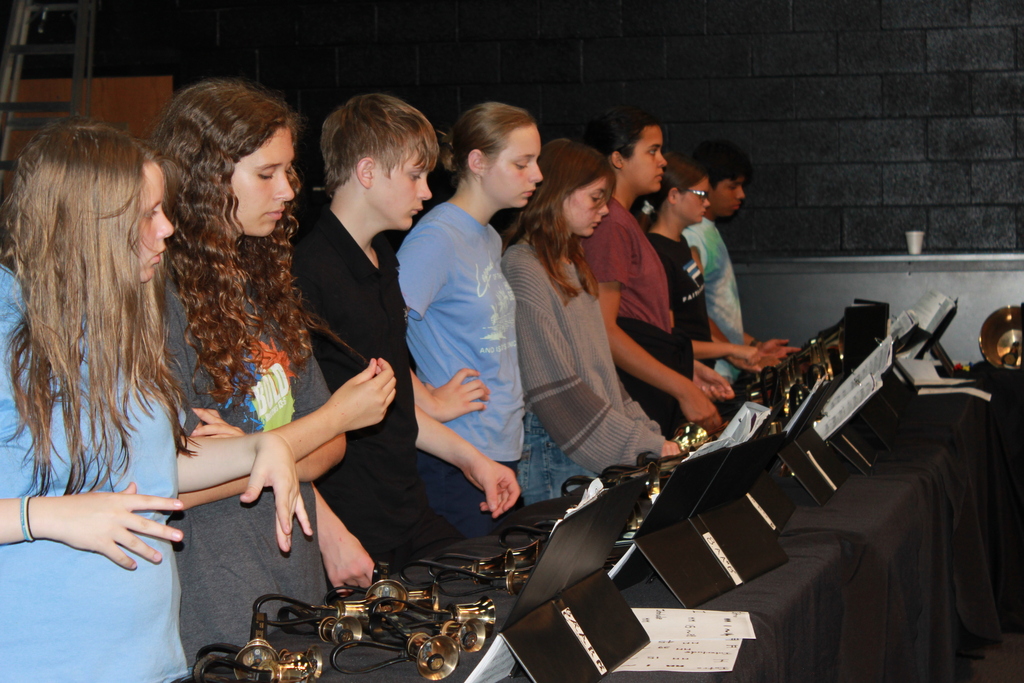 Teens practicing bell choir