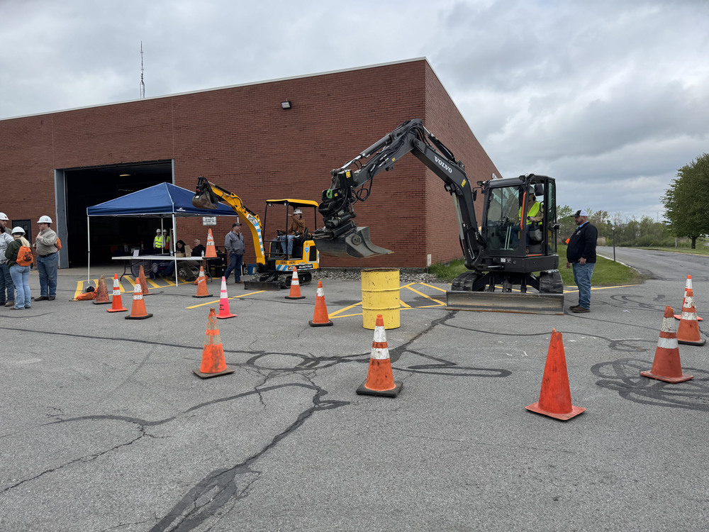 Students operating construction vehicles outside at the Oneida County DPW