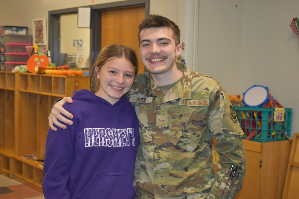 Sister and brother who are BOCES student and BOCES grad with their arms around each other