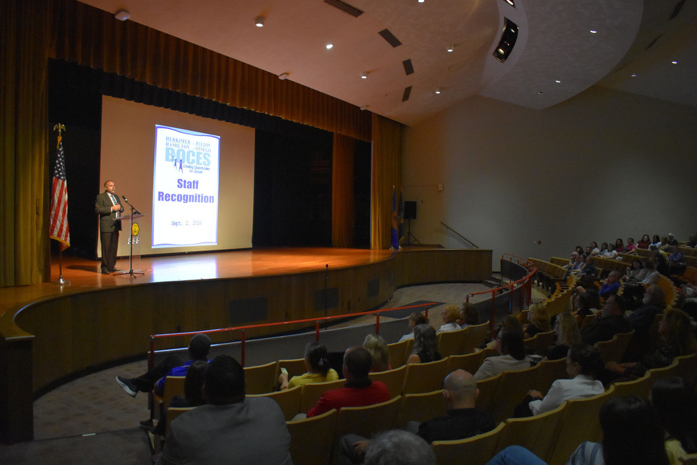 DJ Shepardson speaking to BOCES staff in Herkimer College auditorium