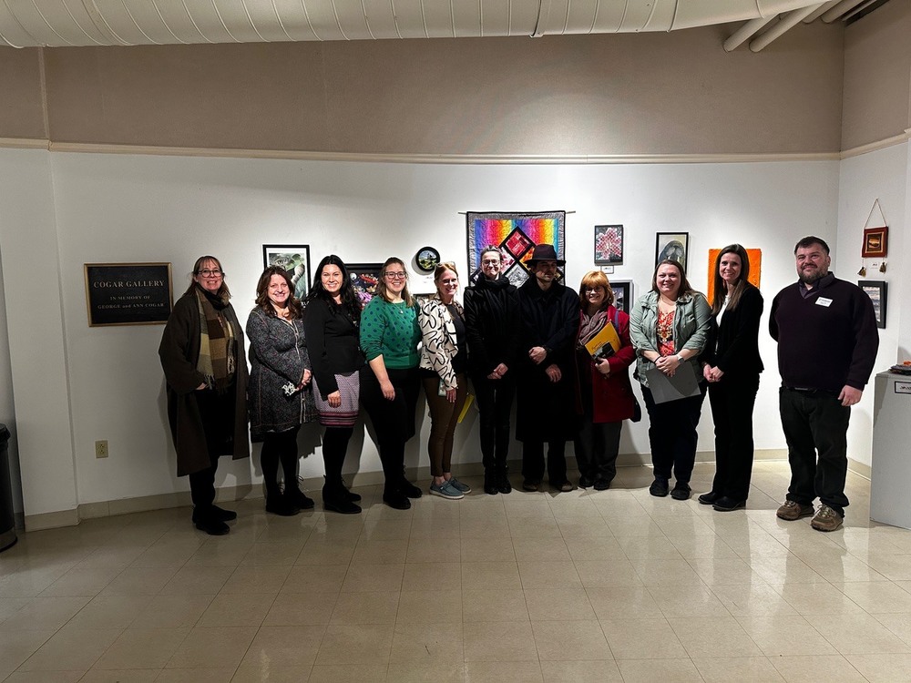 Art teachers at Youth Art Month exhibit