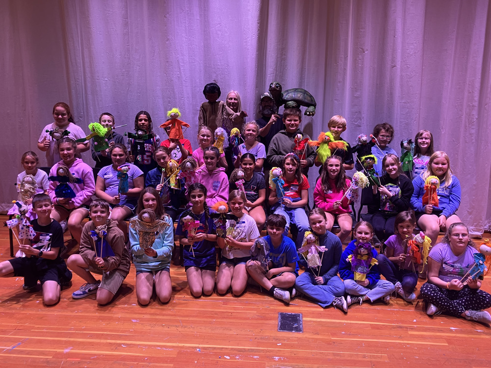 Honors Program students with puppets