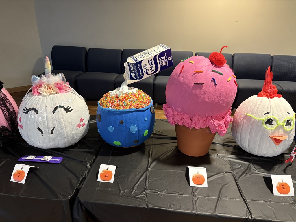 Four decorated pumpkins