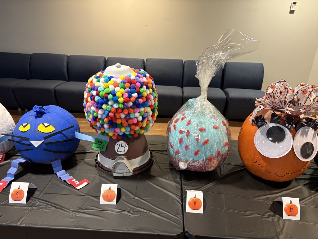 Four decorated pumpkins