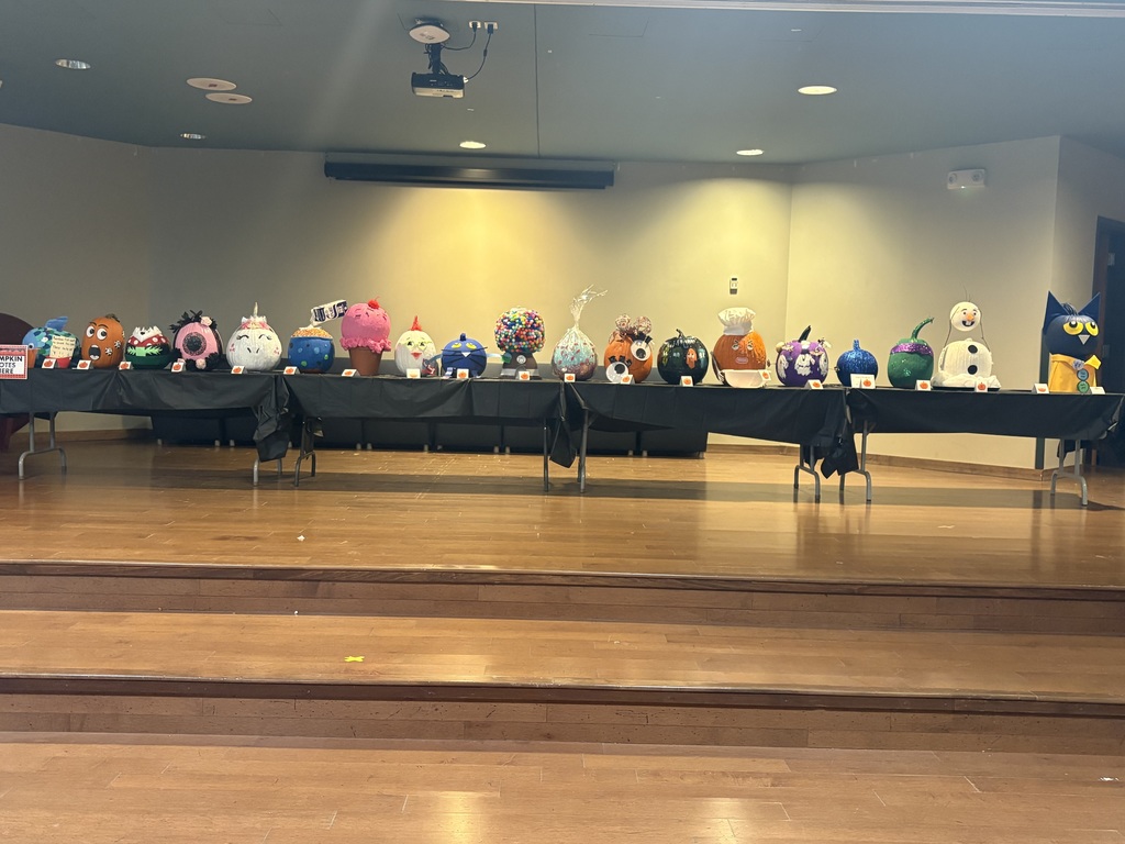 Many decorated pumpkins