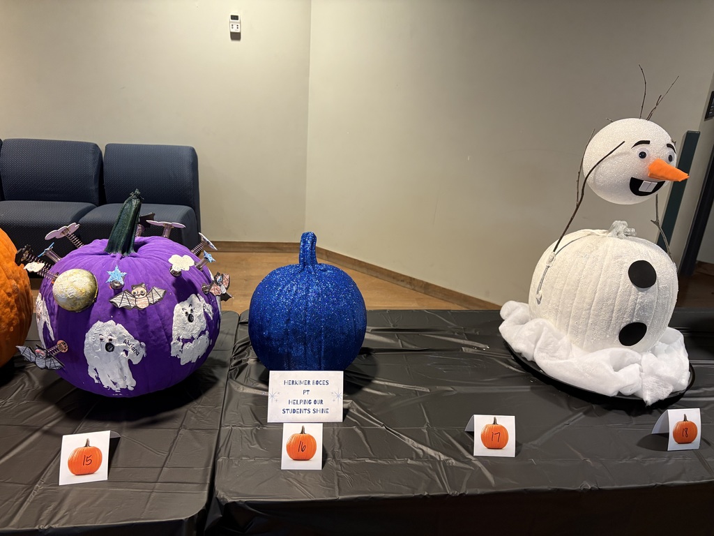Four decorated pumpkins