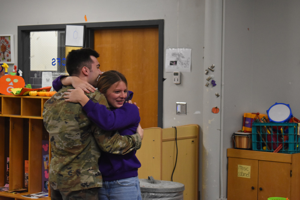 Brother and sister hugging in BOCES Child Family Services classroom.