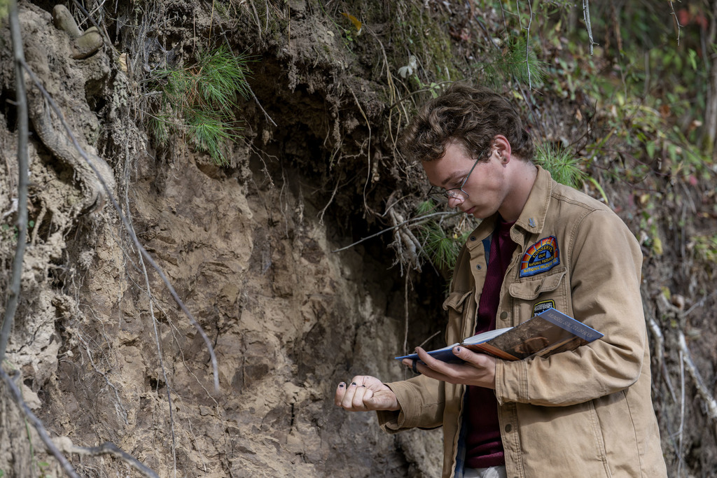 Conservation student working during class