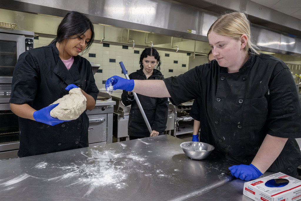 Culinary students working in class
