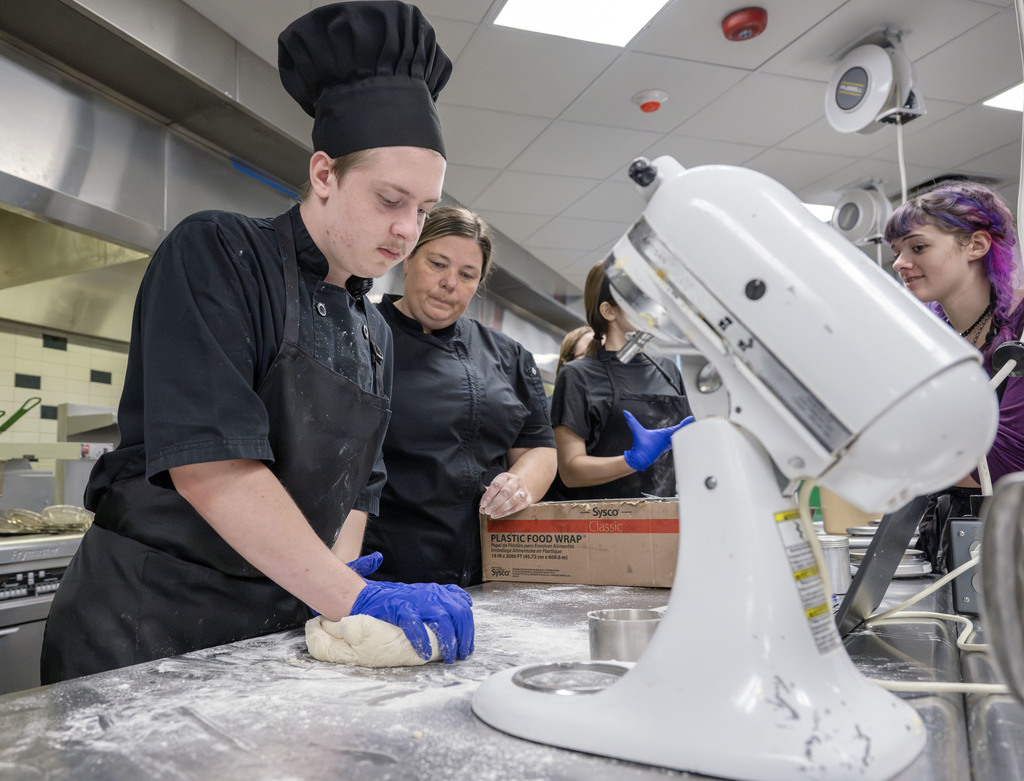 Culinary students working in class
