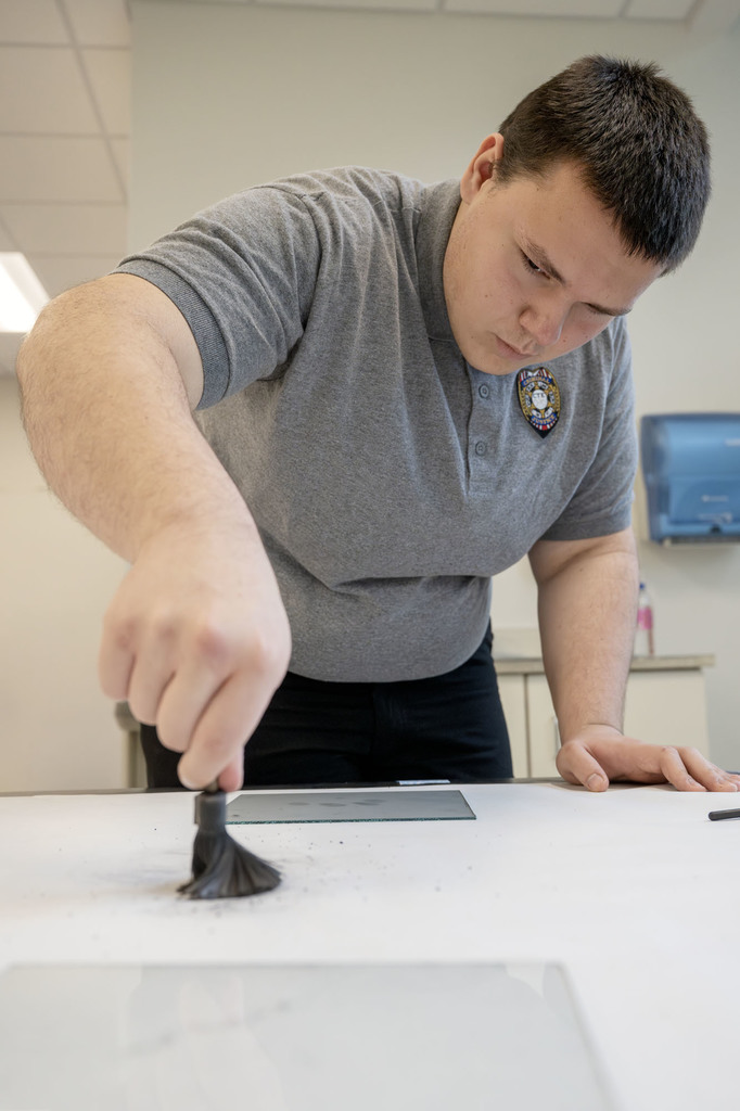 Criminal Justice student working in class