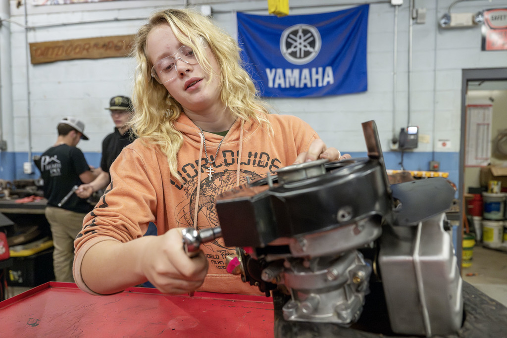 Power Sports student working in class