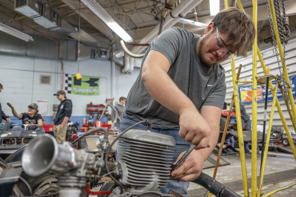 Power Sports student working in class