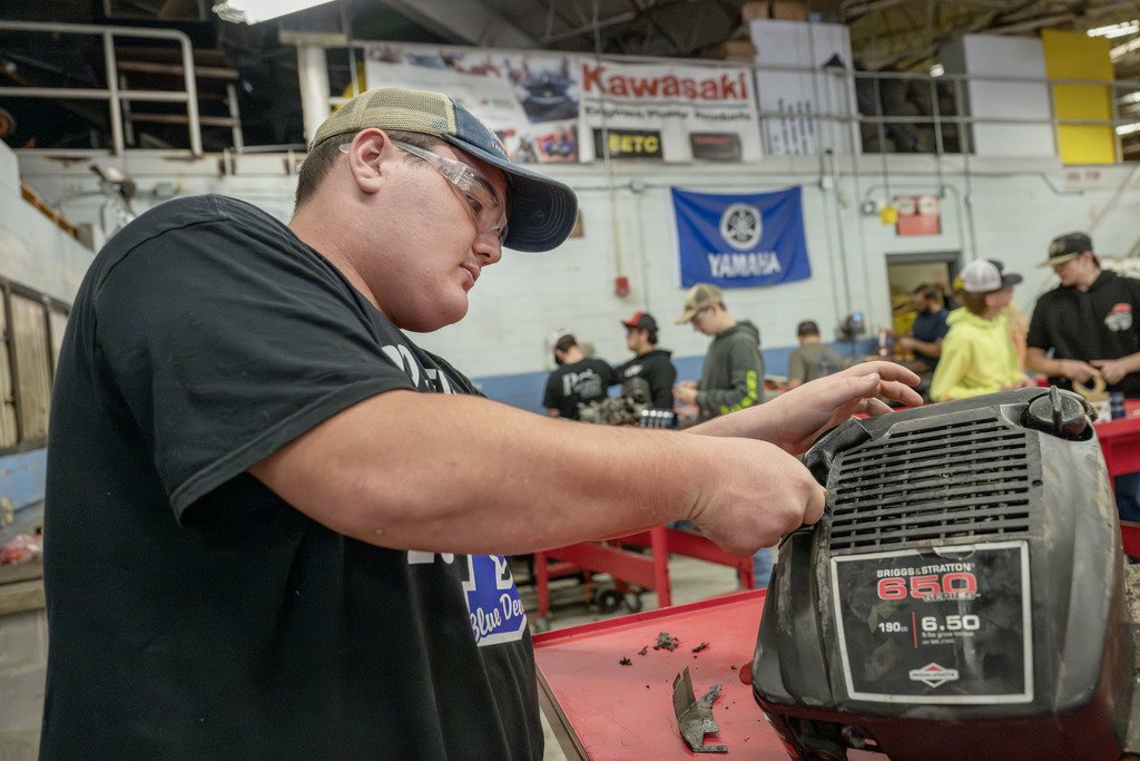 Power Sports student working in class