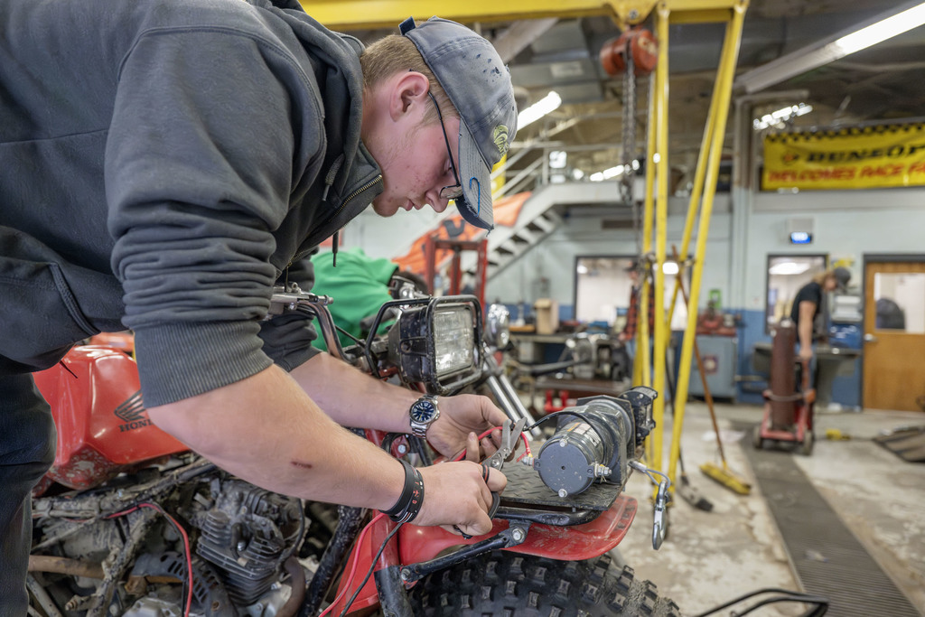 Power Sports student working in class