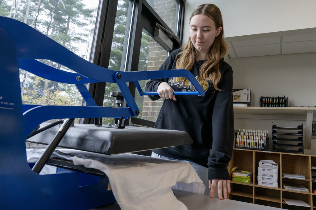 Visual Communications student working in class