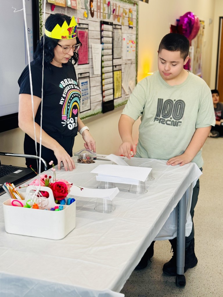 Two people working on an activity