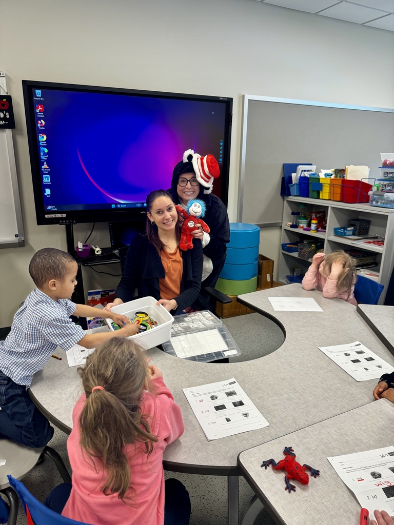 Teacher, "Cat in the Hat" and two students