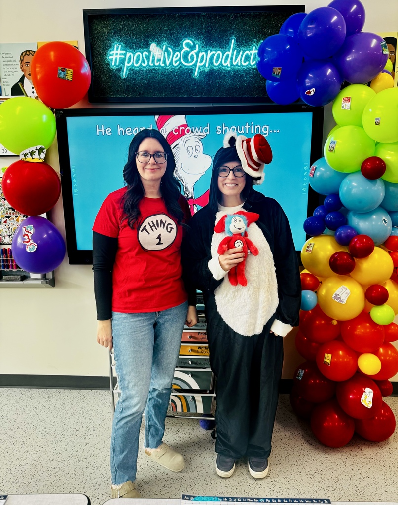Staff members in Thing 1 and Cat in the Hat costumes