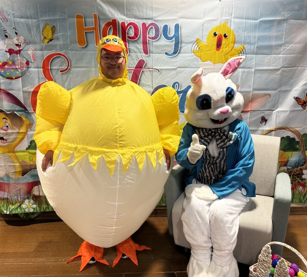 Easter Bunny and a person in an inflatable chick costume