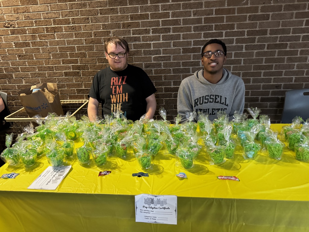 Two students at table