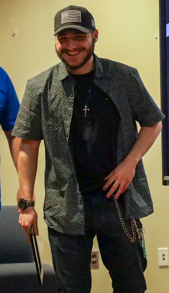 Michael Grecco walking and smiling