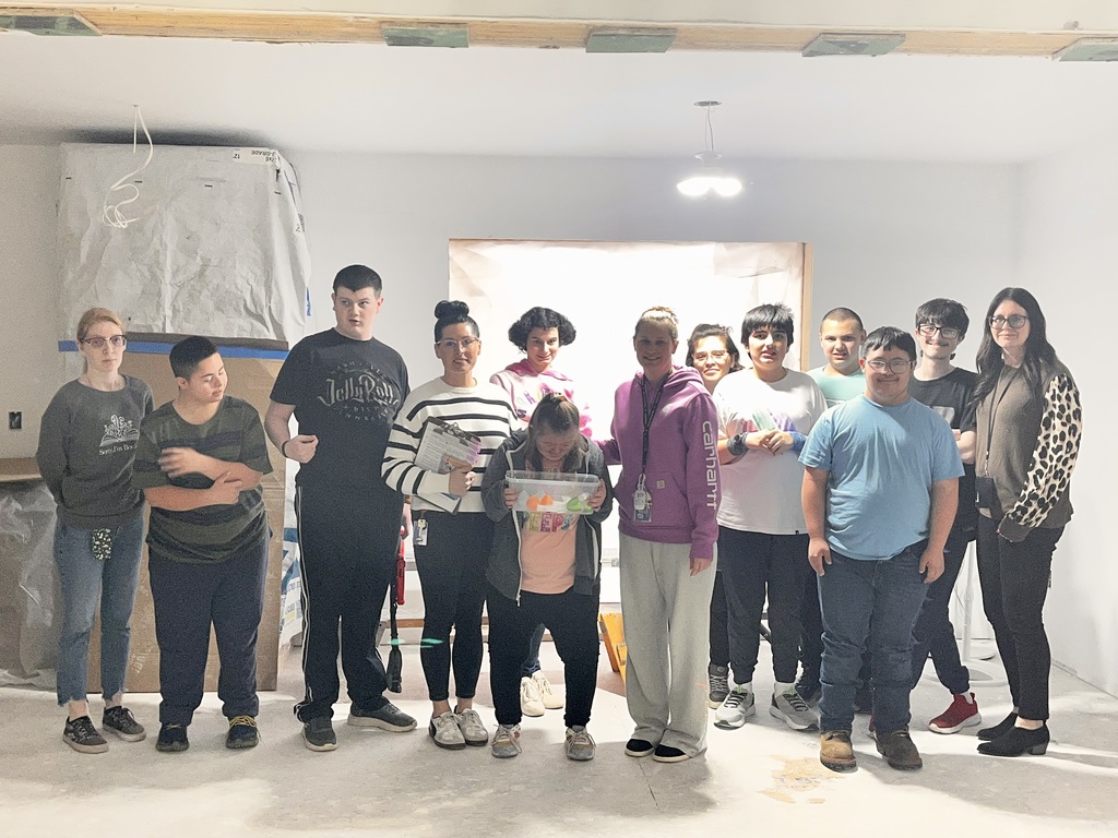 Career Prep students in house being built by Building Construction students