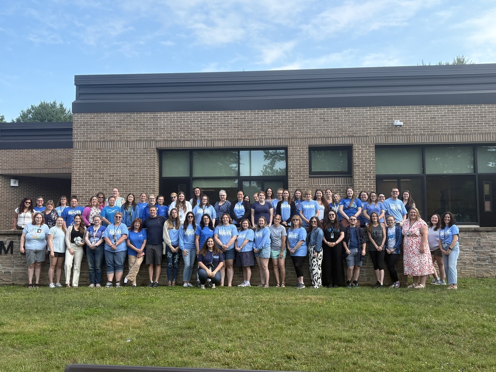 Many special programs staff posing outside the WEB Complex