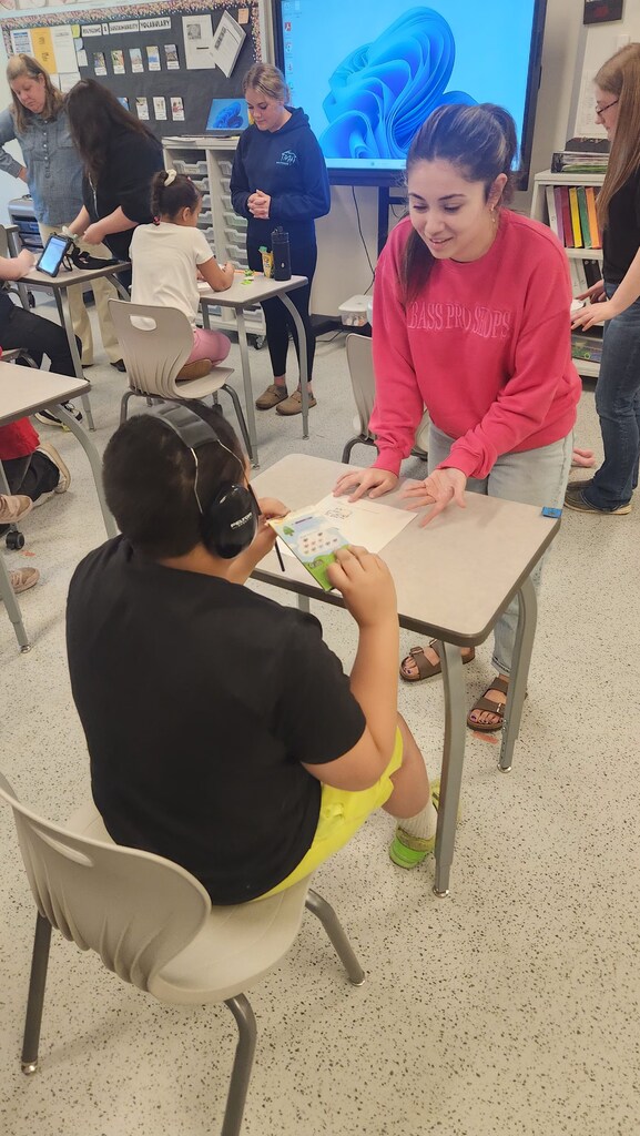 Special Programs students, CTE students, staff and Holly Pollis participating in Ag Literacy Week activities