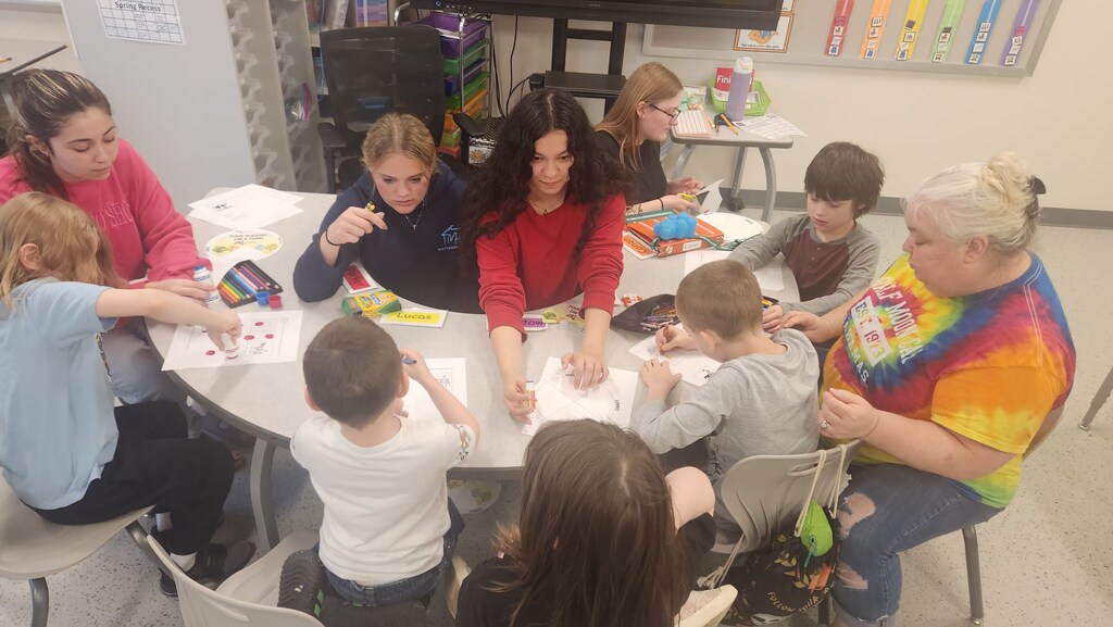 Special Programs students, CTE students, staff participating in Ag Literacy Week activities