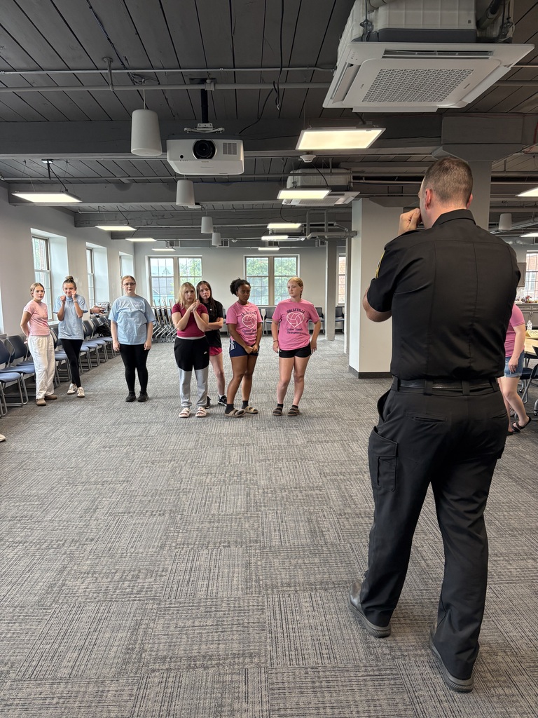 Students practice self defense with Herkimer police officer